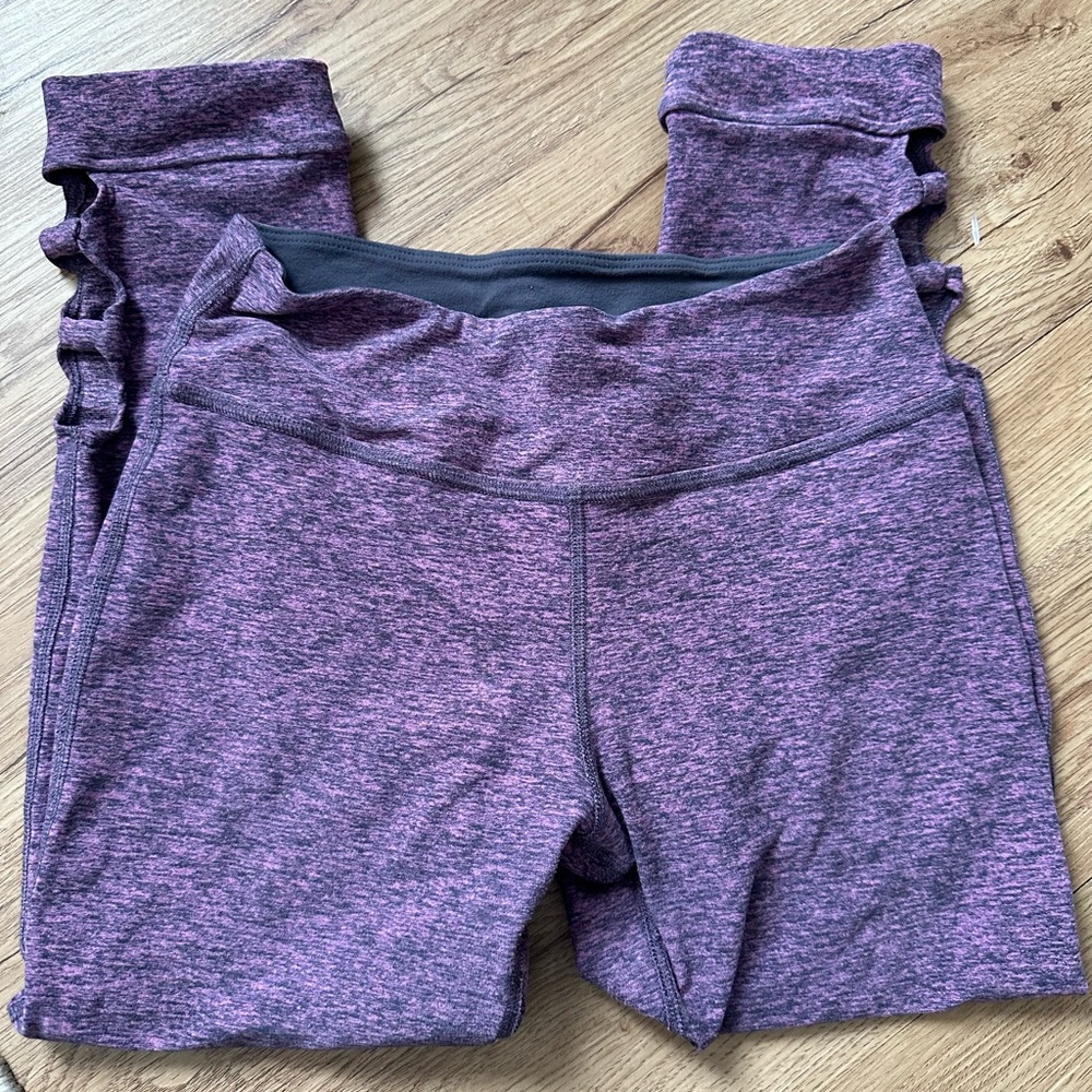 Beyond yoga purple flexible capris with side cut outs